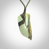 Hand carved jade matau, hook, pendant. Hand made in New Zealand from beautiful and striking Jade.